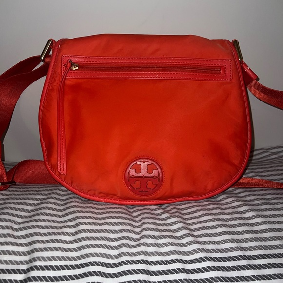 Tory Burch Handbags - Tory Burch Red Crossbody Bag with Flap Design and Matching Strap
